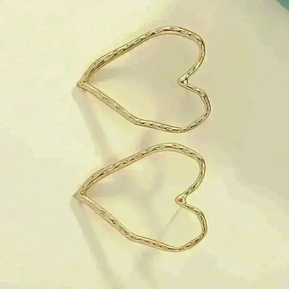 Hollow Heart Shaped Stud Earrings - Picture 3 of 5